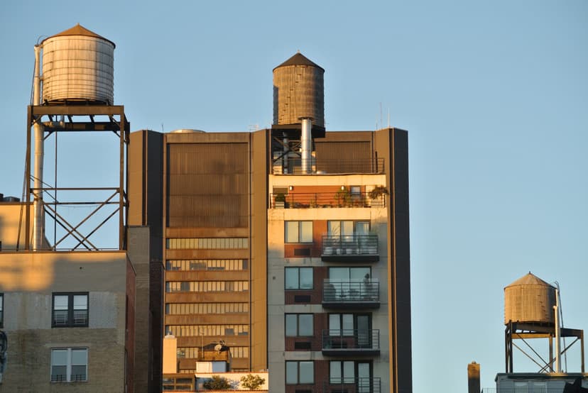 Close-up view of wooden water tanks on NYC rooftops